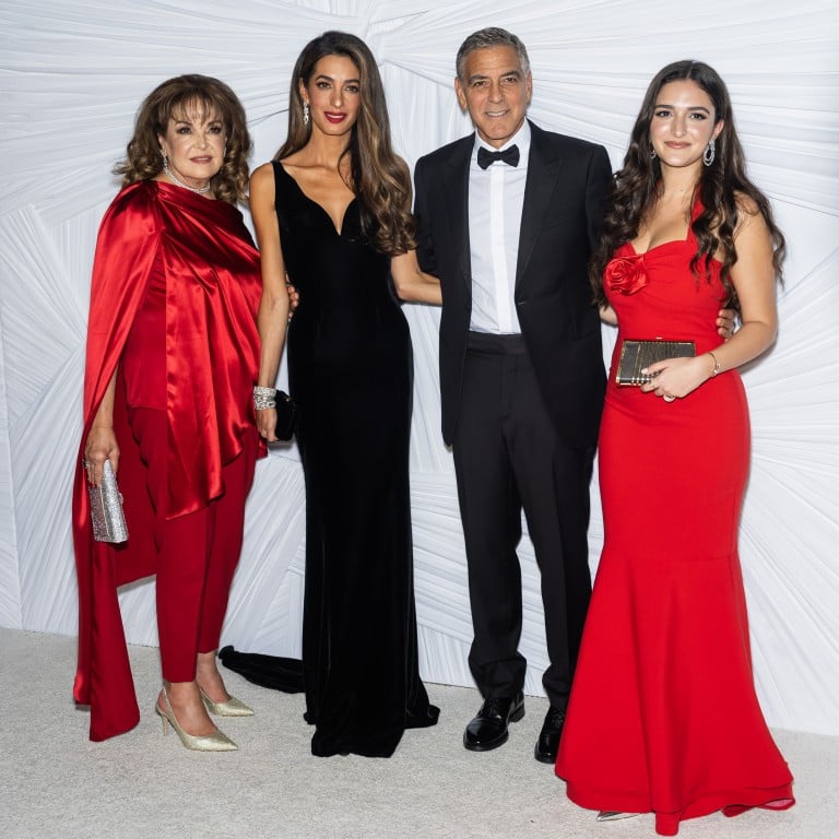 George and Amal Clooney were joined by their niece, Mia Hamiyeh (far right), at the Clooney Foundation for Justice’s The Albies in October. Photo: Getty Images