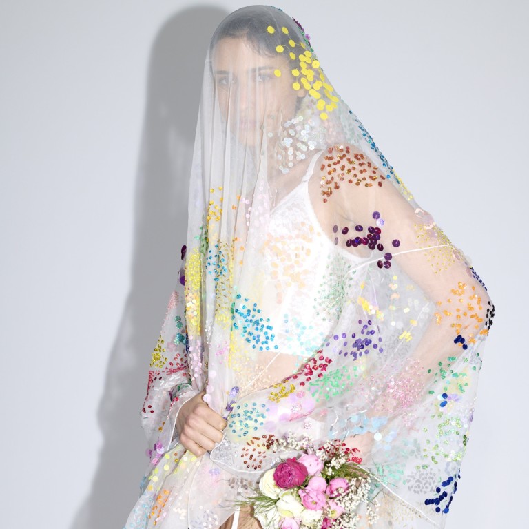 Brides are eschewing the traditional all-white look for something more colourful, like this dress from the Ashish bridal collection. Photo: Handout