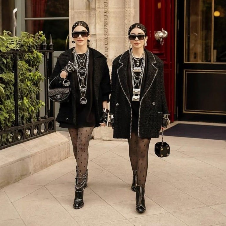 Snehal and Jyoti Babani, aka Snejyo, in black Chanel outfits. Photo: @snejyo/Instagram
