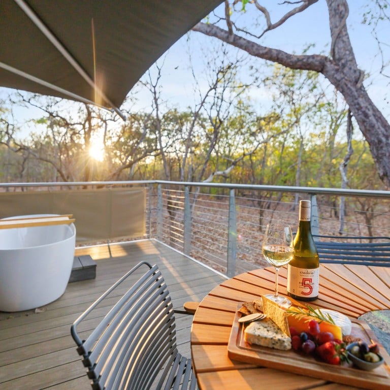 Glamping at Cooinda Lodge, in Australia’s Northern Territory, includes an outdoor bathtub in which to wallow and enjoy the sunset. Photo: Handout