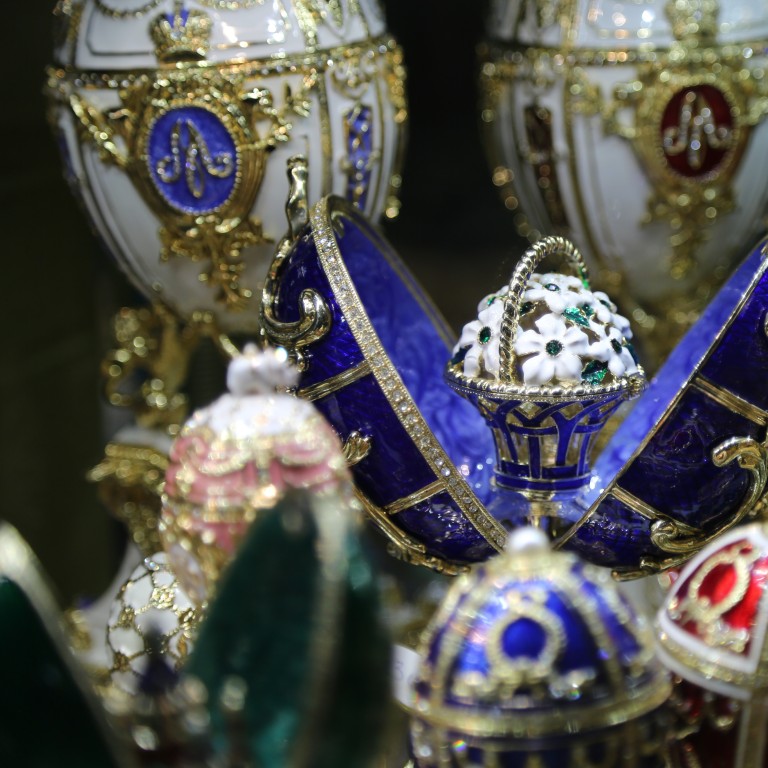 A group of Fabergé eggs in various colors displayed in a museum in St Petersburg, Russia. Photo: Shutterstock