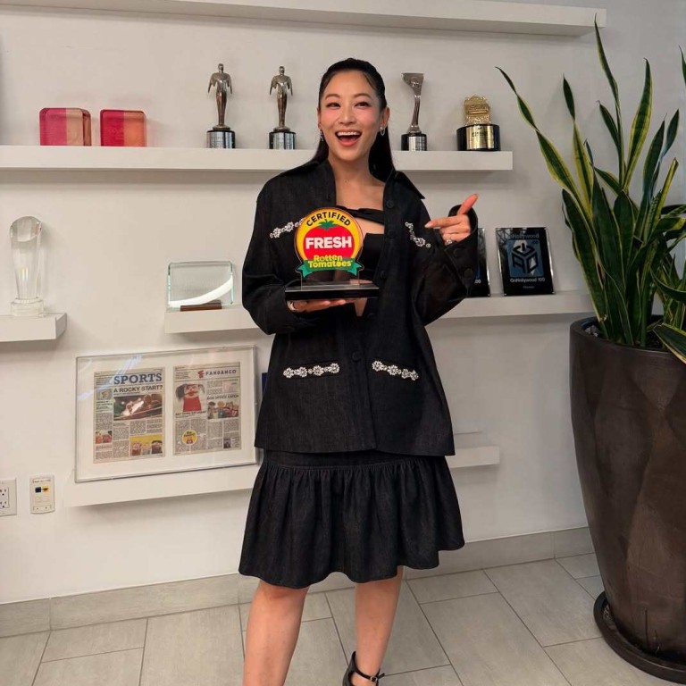 Arden Cho poses with an award for her Netflix film KPop Demon Hunters. Photo: @arden_cho/Instagram