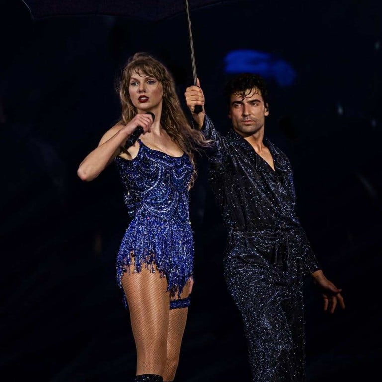 Jan Ravnik dancing onstage with Taylor Swift during The Eras Tour. Photo: @janravnik/Instagram