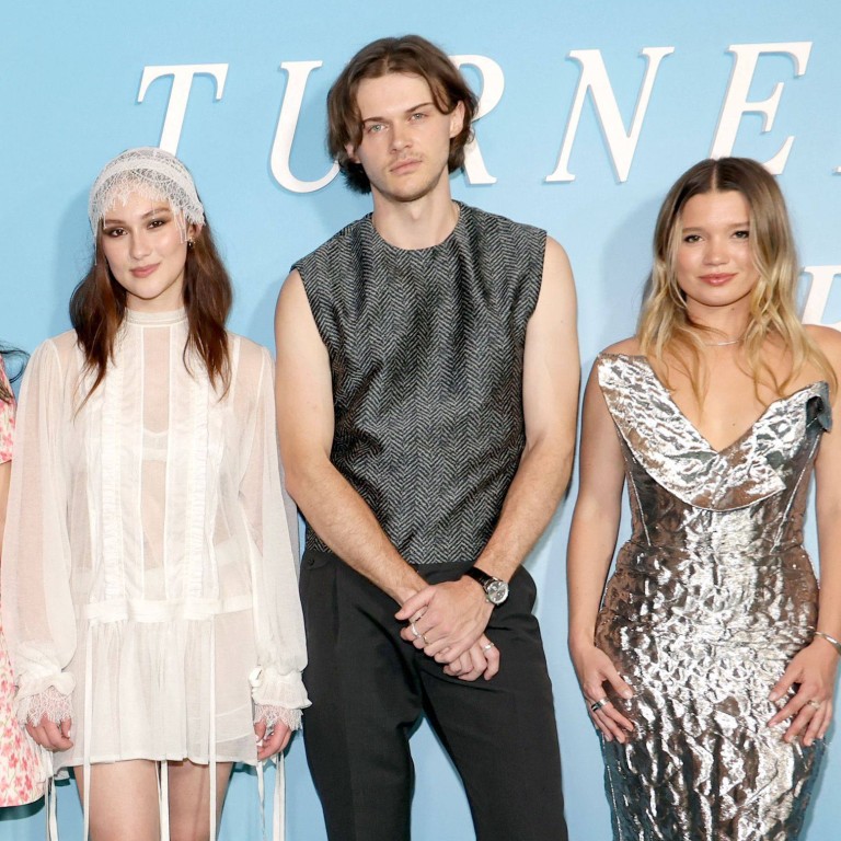 From left: Sean Kaufman, Gavin Casalegno, Jenny Han, Lola Tung, Christopher Briney and Rain Spencer celebrating TSITP’s season three launch in July. Photo: Getty Images