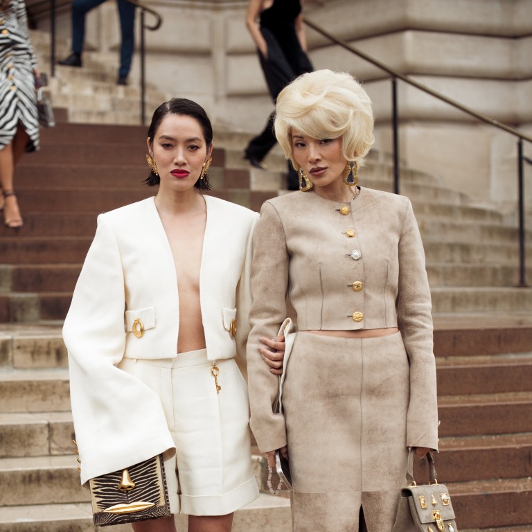 Tiffany Hsu and Tina Leung wear ensembles from Schiaparelli at the maison’s autumn/winter 2025-26 show during Paris Haute Couture Week in July. Photo: Getty Images