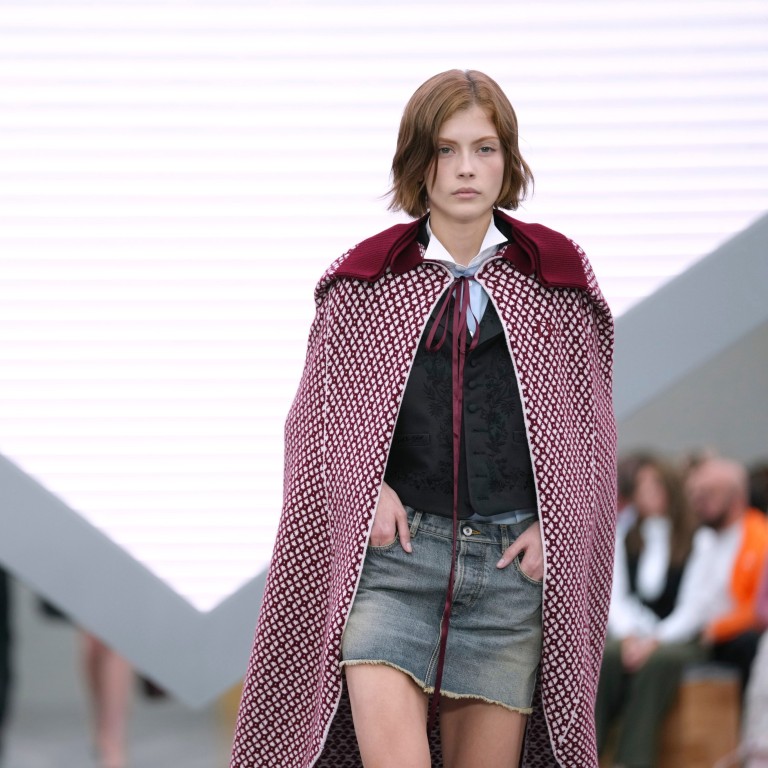A cape paired with a denim miniskirt at Dior’s spring/summer 2026 show. Photo: AP