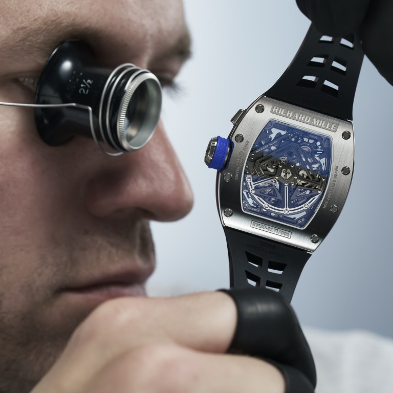 A Richard Mille RM30-01 model is given a close inspection. Photo: Handout