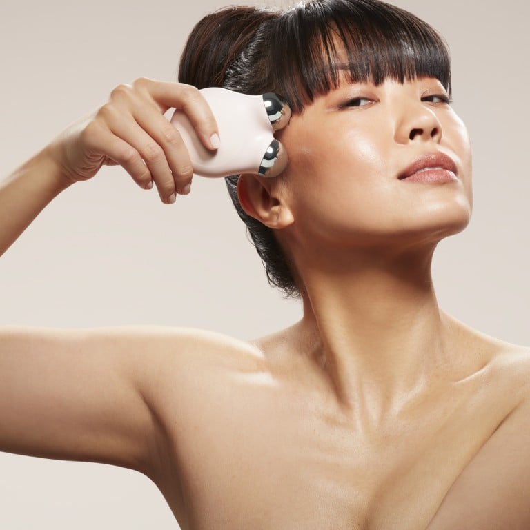 Lymphatic drainage massage gadgets, like this NuFace by Trinity, are all the rage recently. Photo: Handout