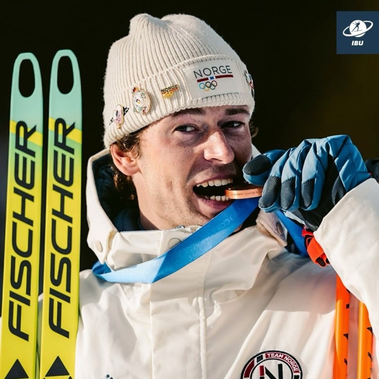 Sturla Holm Lægreid celebrating his Olympic broze medal win. Photo: @biathlonworld/Instagram