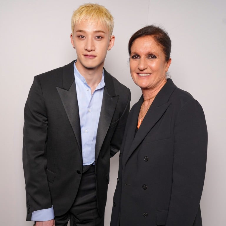 K-pop star Bang Chan and Fendi’s Maria Grazia Chiuri at the Fendi fall/winter 2026 show during Milan Fashion Week. Photo: Getty Images