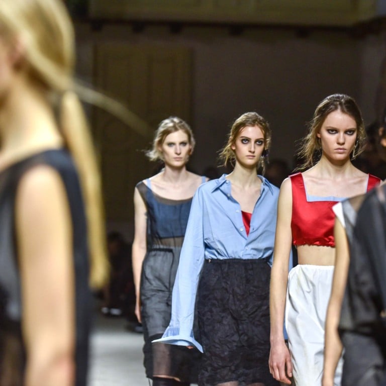 Models in a semi-state of undress at Prada. Photo: EPA