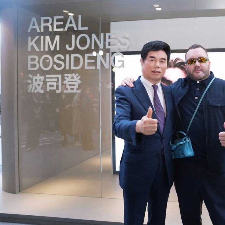 Bosideng chairman and CEO Gao Dekang with designer Kim Jones at an Areal pop-up in Hong Kong during Art Basel. Photo: Handout