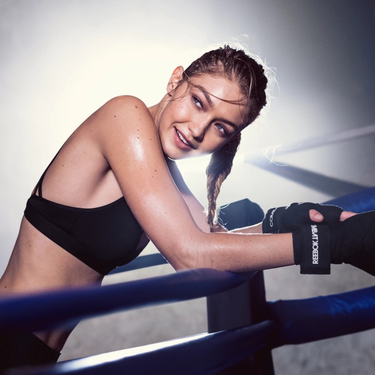 Gigi Hadid staying fresh-faced in a fitness-focused collaboration with Reebok. Photo: Handout