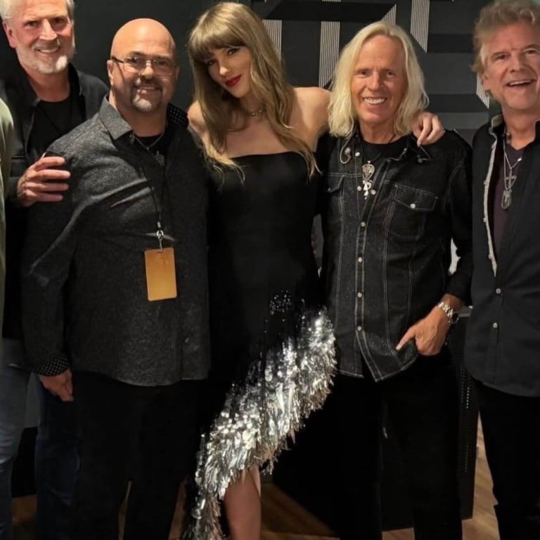 Taylor Swift (centre) this week, wearing Monse and posing with the band Sixwire. Photo: Photo: @tokibunbun/Instagram
