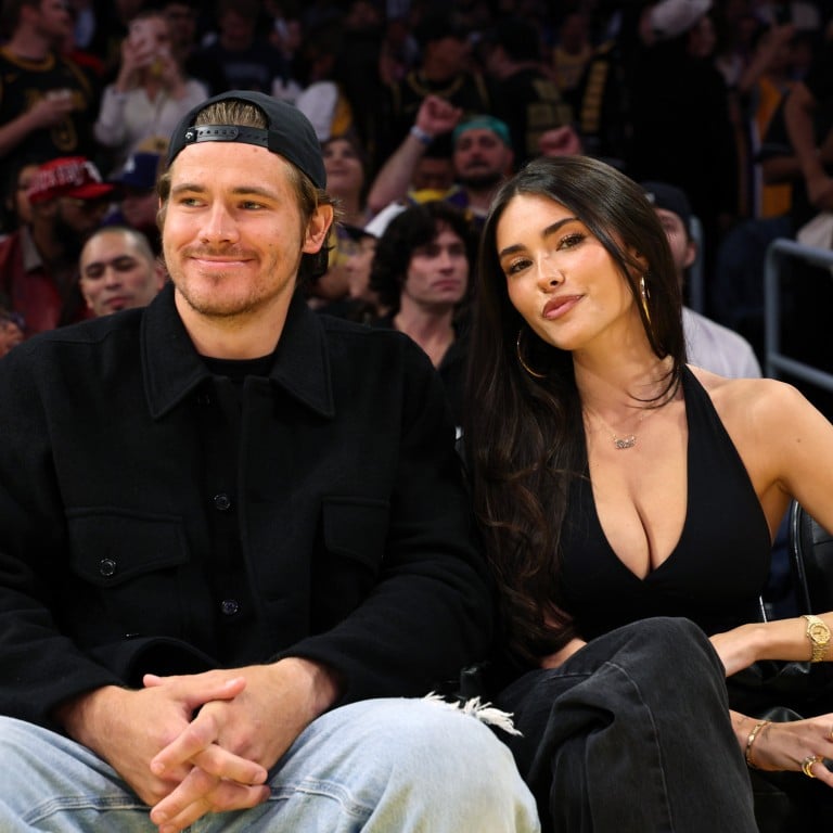 Justin Herbert and Madison Beer at a basketball game between Los Angeles Lakers and Minnesota Timberwolves last year. Photo: Getty Images