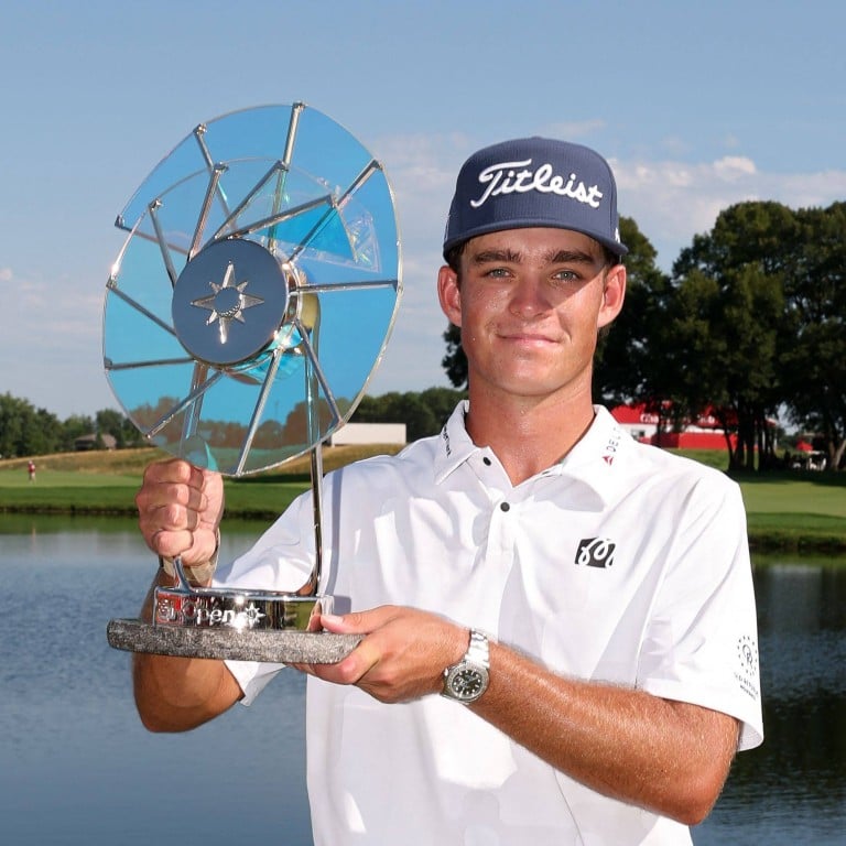 Jackson Koivun lifts the Elemental Swing trophy after winning the 3M Open on July 26. Photo: Getty Images/AFP