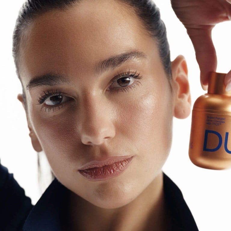 Dua Lipa with the Supercharged Glow Complex, a brightening serum from her Dua by Augustinus Bader skincare line. Photo: Handout