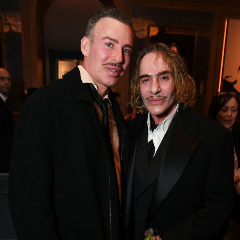 John Galliano (right) and his partner Alexis Roche at English columnist Meg Mathews’ 60th birthday in London in March. Photo: Getty Images