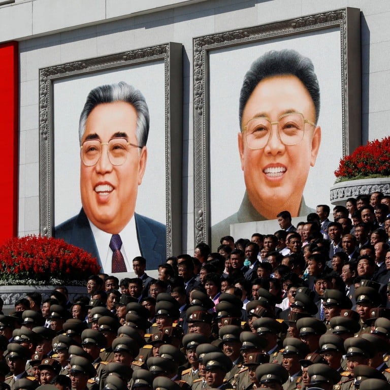 North Korean Dissident Smashes Portraits Of Kim Il Sung And Kim