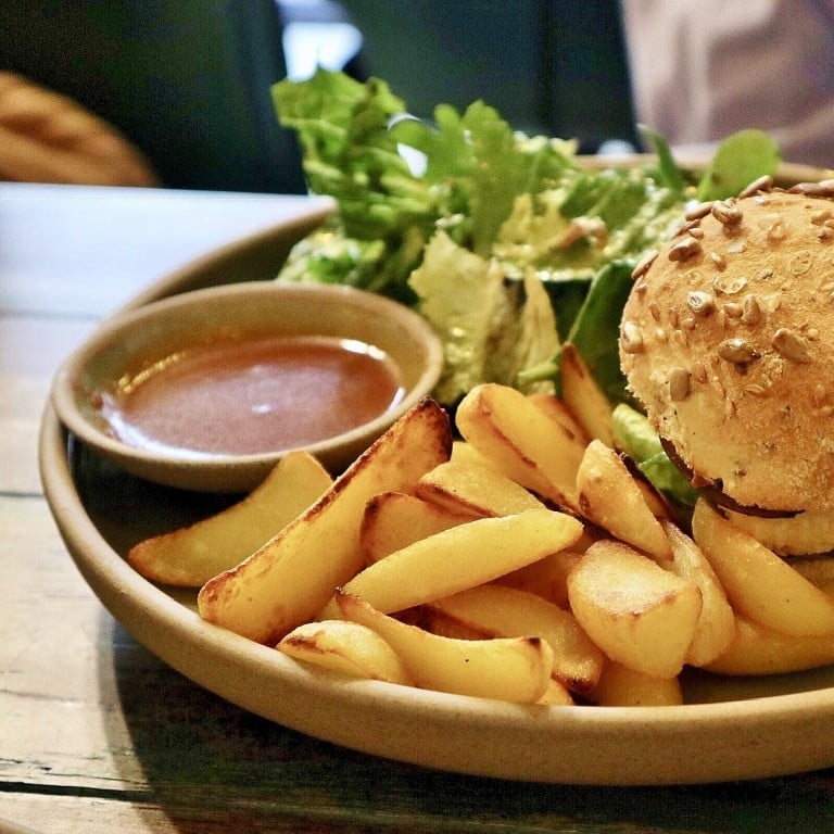 Dandy's Organic Cafe’s fried tofu burger with sautéed aubergine and lettuce, served with salad, potato wedges and soup of the day, was one of 10 burgers we tried, but which was our favourite? Photos: Kayla Hill