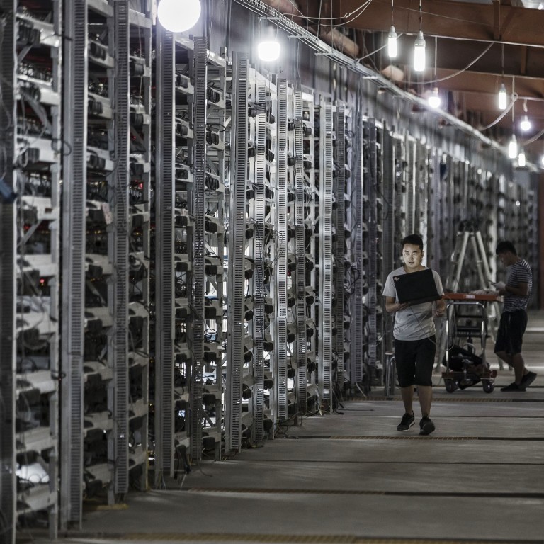 Inside The Rise And Fall And Rise Of Crypto Mining Gian!   t Bitmain - technicians inspect bitcoin mining machines at a mining facility operated by bitmain technologies ltd in