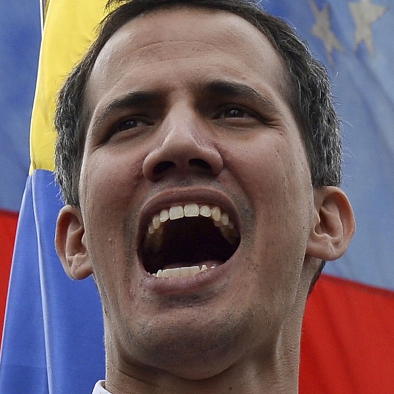 Venezuelans Take To The Streets As Power Struggle Between Juan Guaido And President Nicolas 4976