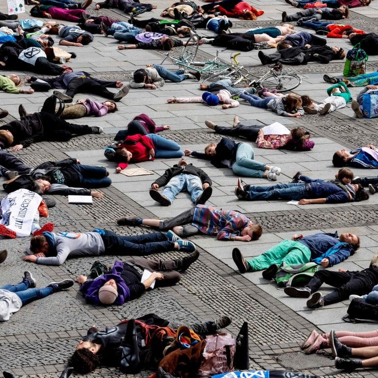 Extinction Rebellion Climate Change Activists Stage Mass Die In