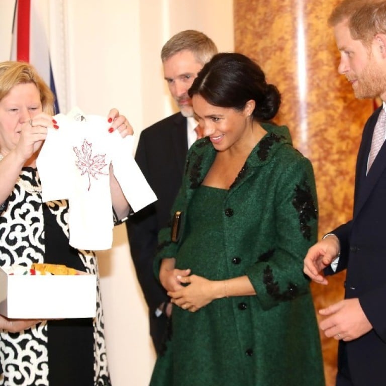 Meghan, Duchess of Sussex and Britain’s Prince Harry are presented with baby gifts by the Canadian High Commissioner to the United Kingdom, Janice Charette (second from left), at Canada House in central London, on March 11, 2019. Photo: Chris Jackson / AFP