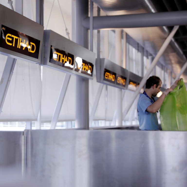 etihad check in luggage