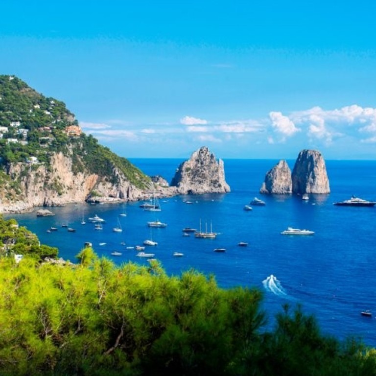 Yachts moored off the coast of Capri, in Italy, which is ranked equal second in a survey of the world’s nations with the most superyachts, carried out in April by Bloomberg. Photo: Getty Images