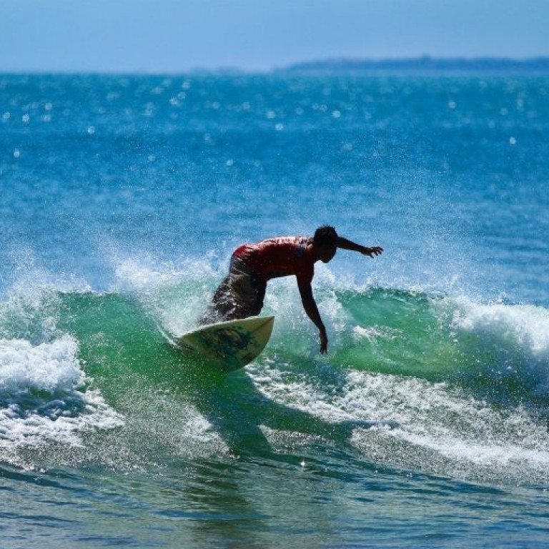 The waves around the resort and beach area of Kuta, one of the Indonesian island of Bali’s earliest tourist developments, are ideal for surfers of all abilities. Photo: Wikimedia