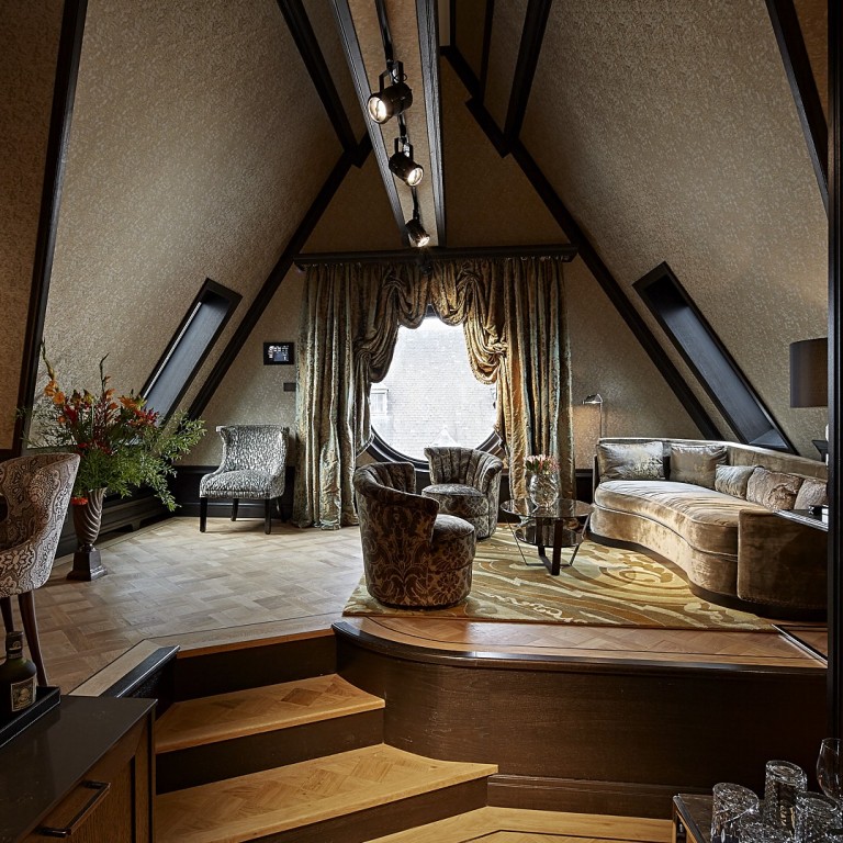 The living room of the luxurious, two-storey Rooftop Loft Suite at Hotel TwentySeven in Amsterdam. Photo: Winnie Chung