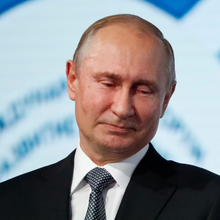 Russian President Vladimir Putin formally suspends country ...