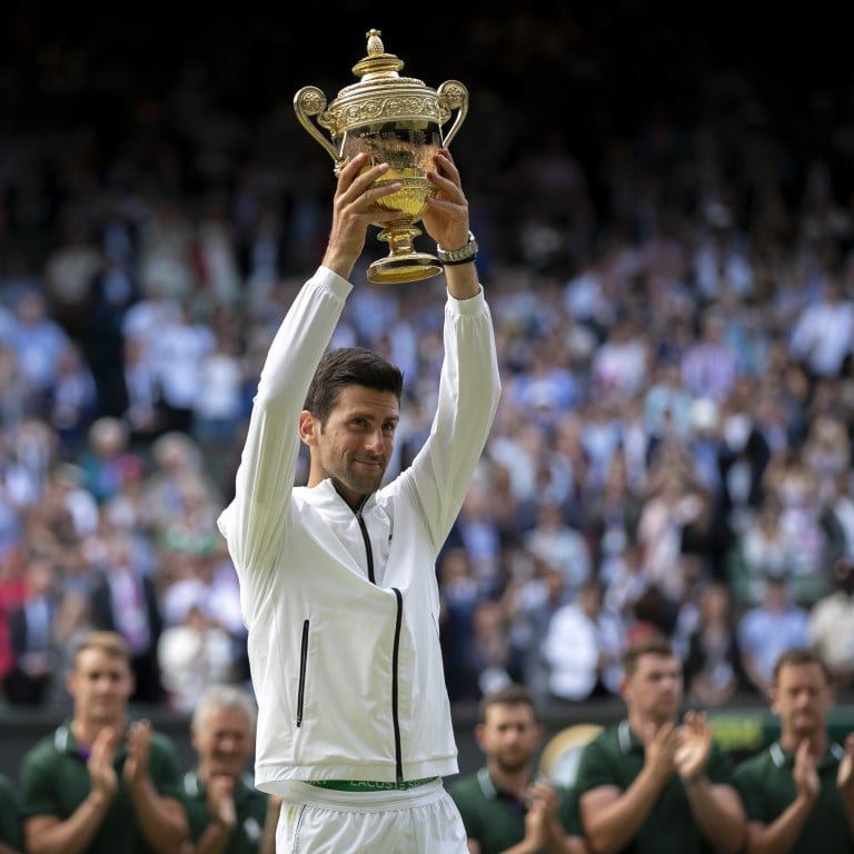 Novak Djokovic of Serbia holds the trophy after winning the men’s singles final against Roger Federer of Switzerland at Wimbledon. Photo: Xinhua