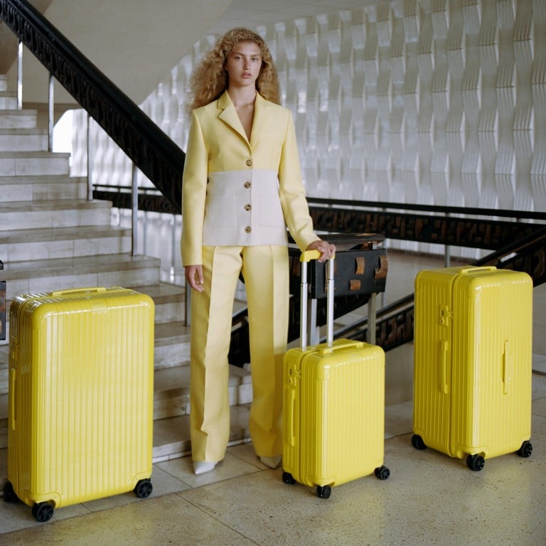 The Rimowa Essential line of suitcases is available in four colours – coral, slate, sage and saffron (shown).