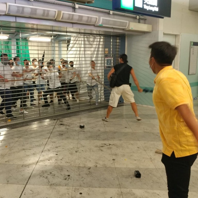 Hong Kong Town Of Yuen Long Haunted By Black And White Colours Of
