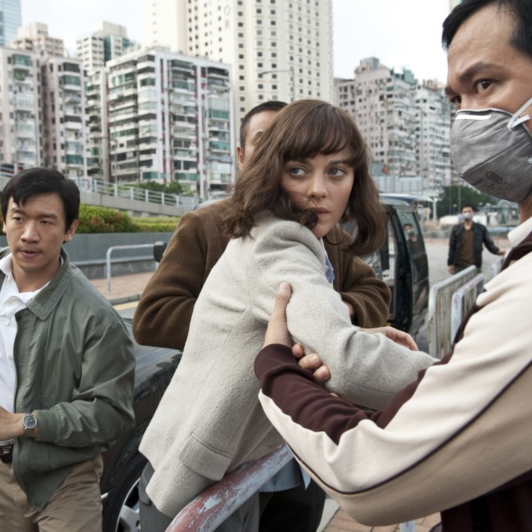 Actor Chin Han (left) and actress Marion Cotillard (centre) in a scene from the 2011 film Contagion, partly set in Hong Kong, which sees the world battling the spread of a deadly virus.