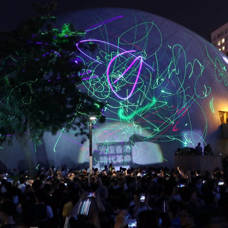Protesters Shine Light On Arrest Of Hong Kong Student With New Kind Of Laser Rally South China Morning Post