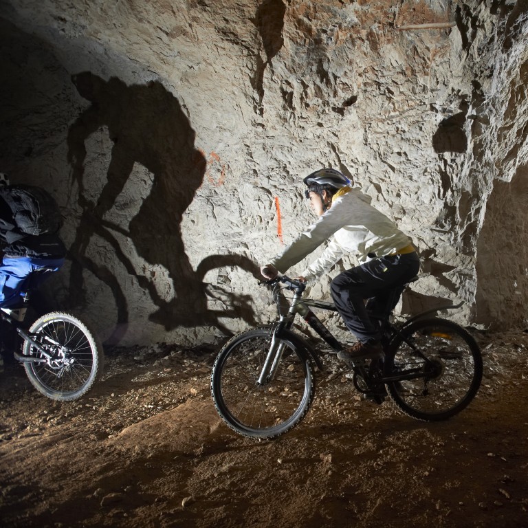Underground cave biking in Slovenia is a popular adventure.