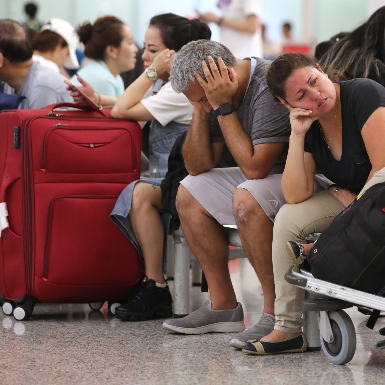 Stranded Passengers At Hong Kong International Airport Left