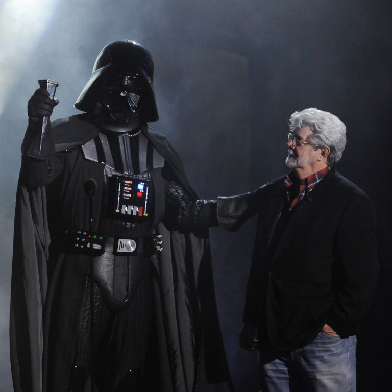 Darth Vader accepts the Ultimate Villain award from Star Wars creator George Lucas during the 2011 Scream Awards in Los Angeles. The soft-spoken billionaire became the richest celebrity in the US in 2018. Photo: AP
