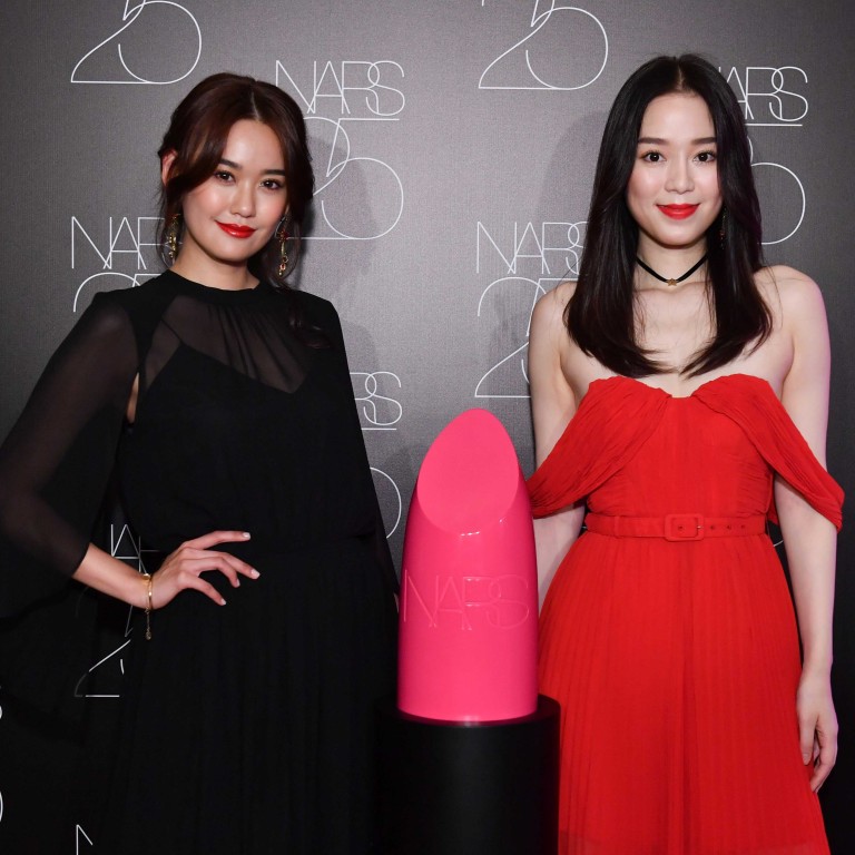 Angel Chu and Zelia Zhong attend the NARS 25th anniversary opening party.