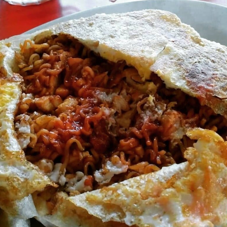 Roti Maggi is sheer delight for its playful spin on two Malaysian favourites: roti canai and Maggi goreng (stir-fried instant noodles). Photo: Instagram/janism.ch