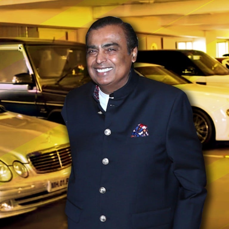 Mukesh Ambani with some of his cars in his garage – the first six floors of the Ambanis’ Antilla home is dedicated to cars. Photo: YouTube