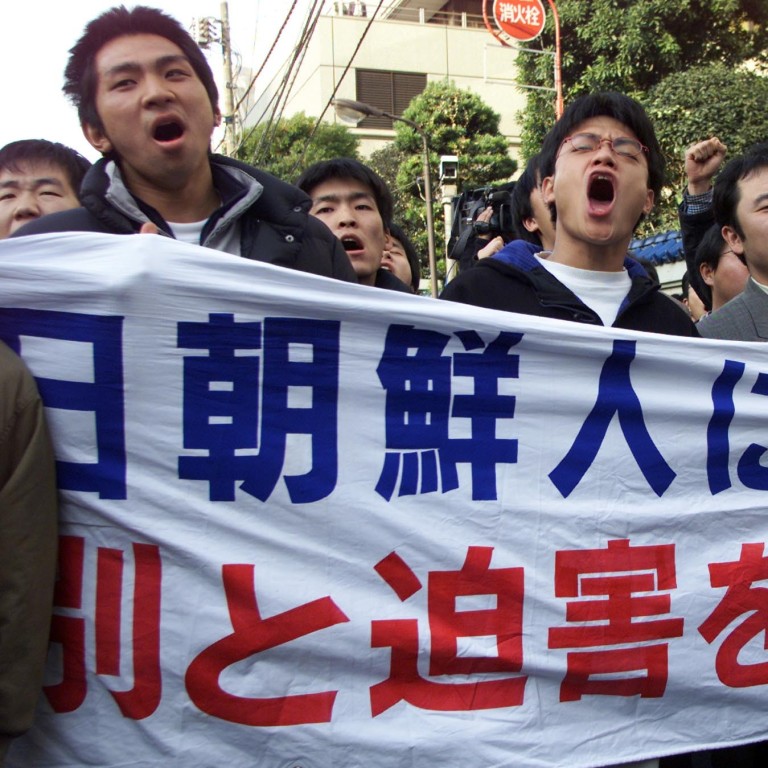 North Koreans in Japan rally against Shinzo Abe’s move to axe funding