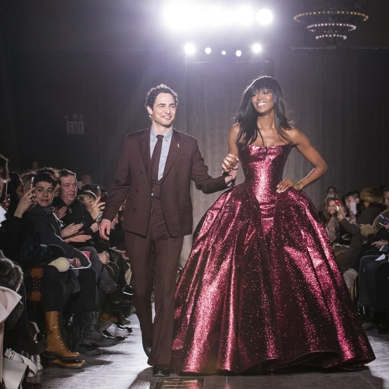 Designer Zac Posen and model Naomi Campbell greet the crowd at New York Fashion Week in autumn 2015. Photo: AP
