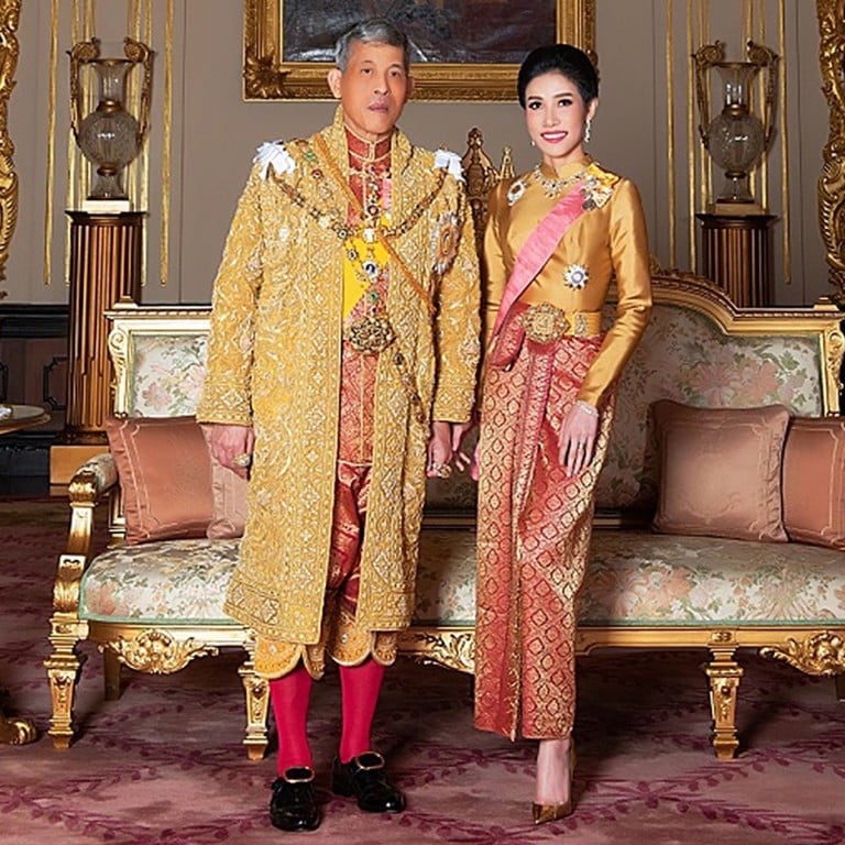 Thailand's King Maha Vajiralongkorn poses with former royal noble consort Sineenat Bilaskalayani, also known as Sineenat Wongvajirapakdi, who was dramatically stripped of all her royal titles by the palace on October 21 – a shock move less than three months after she was bestowed with a position that had not been used for nearly a century. Photo: AFP/Thailand’s Royal Office
