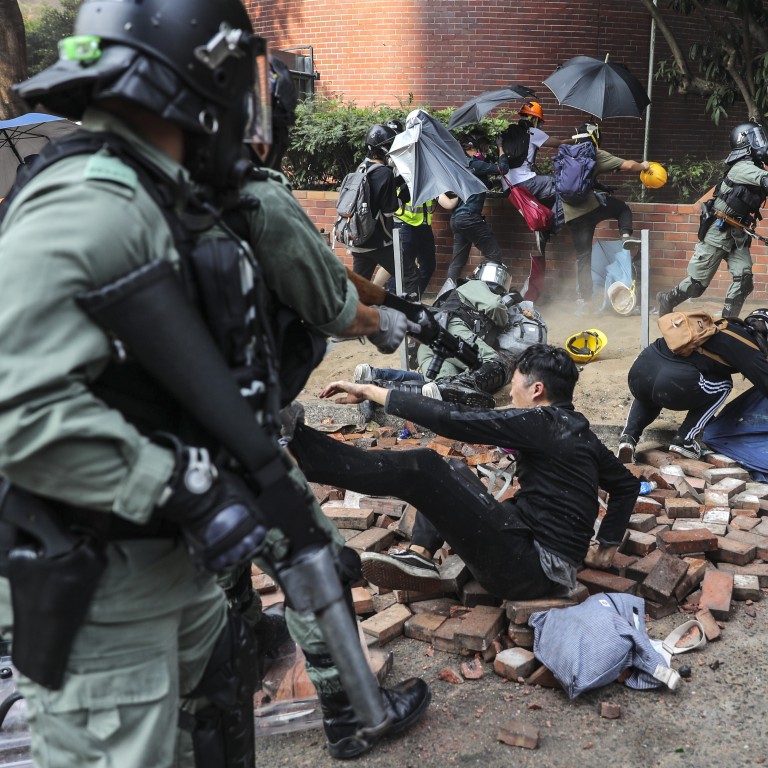 Police made mass arrests on Monday but about 100 radicals were still barricaded inside Polytechnic University in Hung Hom on Tuesday morning. Photo: Sam Tsang