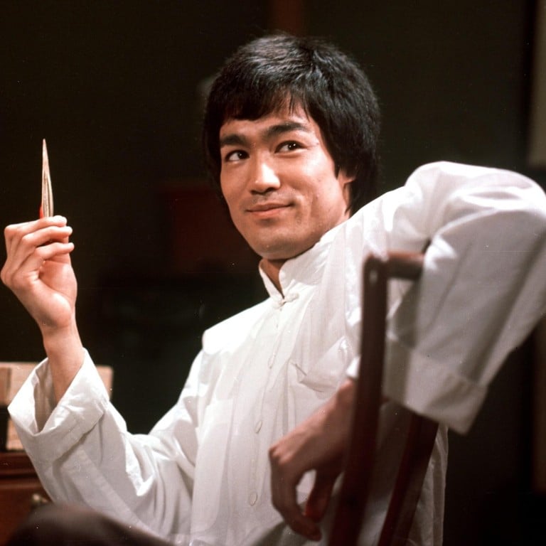 Bruce shop lee smiling
