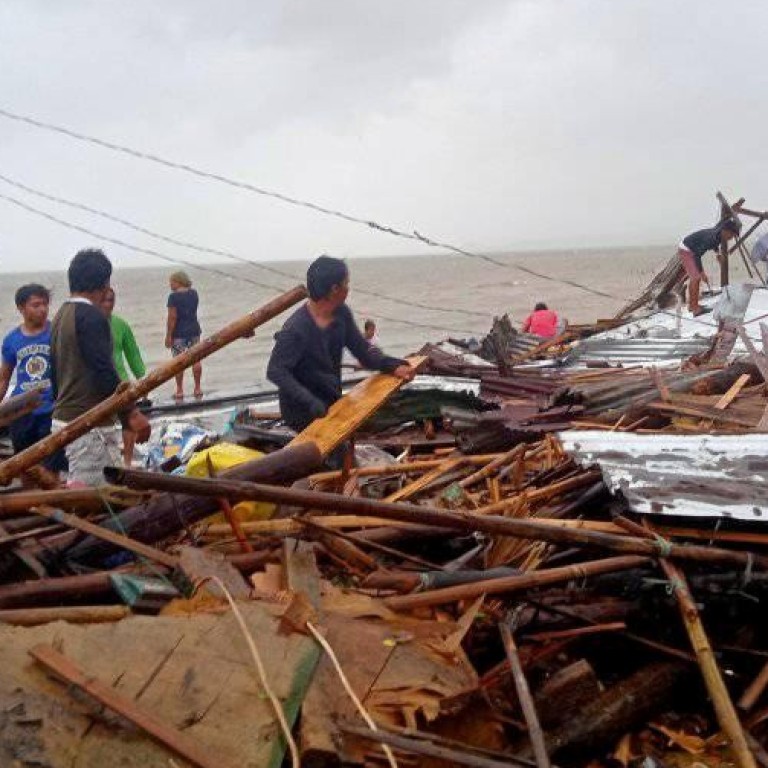 Manila airport reopens after Typhoon Kammuri leaves trail of ...